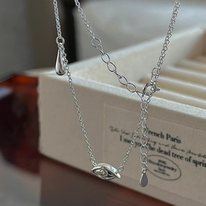 Elegant S925 sterling silver necklace featuring devil eye pendant and water drop detail