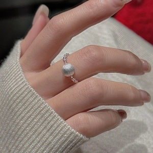Minimalist S925 sterling silver chain ring with brushed bead pendant on white background