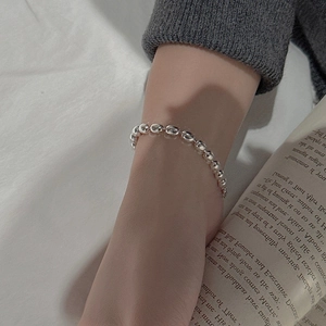 Minimalist S925 sterling silver beaded bracelet with high-shine oval mirror finish beads