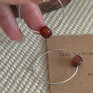 Minimalist S925 silver hoop earrings with vintage carnelian stone beads on white knit background