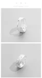 Detailed close-up of S925 sterling silver feather ring with adjustable open band design