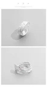 Detailed top and side view of adjustable S925 sterling silver feather ring with fine engraving