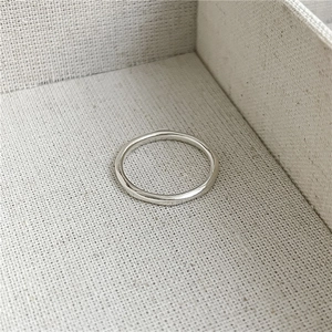 Minimalist S925 sterling silver ring with textured diamond-cut wavy liquid metal design
