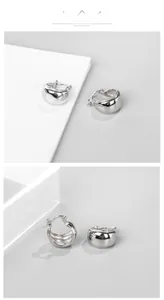 Détails macro des boucles d'oreilles créoles épaisses en argent S925 sous divers angles