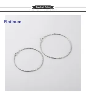 Macro detail of S925 sterling silver chain bracelets with white gold textured finish