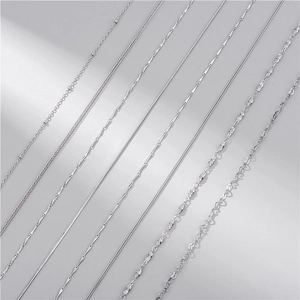 Selection of eight S925 sterling silver chain styles including snake and ball textures