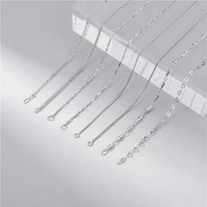 Various S925 sterling silver chain styles including snake, bead, and box designs