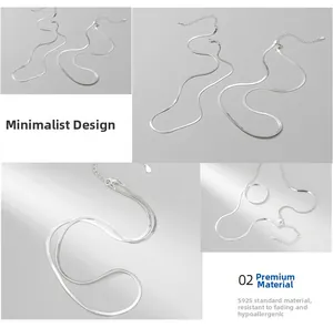 Macro detail of S925 sterling silver snake chain necklace featuring a flat blade design