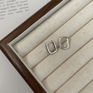 Minimalist S925 sterling silver U-shaped hoop earrings with a polished geometric design
