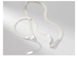 Macro shot of S925 sterling silver woven necklace with adjustable chain and hallmark