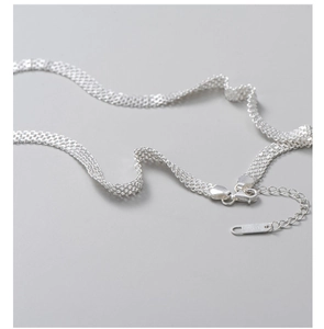 Detail of S925 sterling silver woven mesh necklace with lobster clasp and extension chain