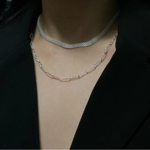 Layered S925 silver wide mesh choker and paperclip chain necklace on a model