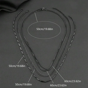 Set of five black stainless steel necklaces including cuban and snake chains in 50cm and 60cm