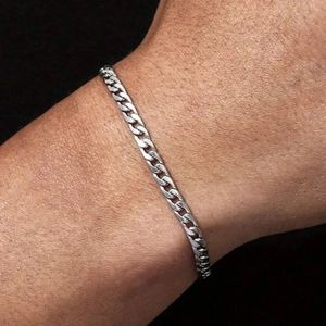 Chunky silver stainless steel curb chain bracelet for hip hop style on wrist