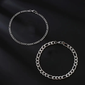 Detail of silver Figaro chain bracelet set in stainless steel with lobster clasp