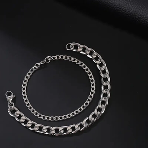 Set of two silver Cuban link bracelets in 4mm and 8mm stainless steel with lobster clasp