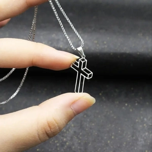 Minimalist silver stainless steel 3D hollow cross pendant necklace on a sleek box chain