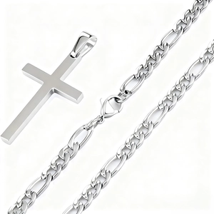 Close-up of polished solid cross pendant and Figaro chain necklace with lobster clasp