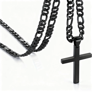 Macro detail of matte black stainless steel Figaro chain and minimalist cross pendant
