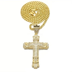 Hip hop gold plated cross pendant with crown detail and iced out stones on cuban link chain