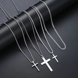 Hip hop stainless steel cross pendant necklace set with various chain styles on black stand