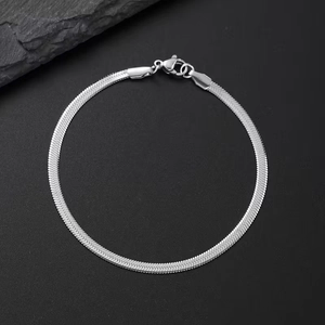 Sleek stainless steel herringbone snake chain set with polished metallic finish and lobster clasp