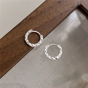 Polished S925 sterling silver hoop earrings with diamond-cut texture and sparkling finish