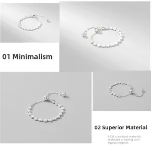 Detail of adjustable S925 sterling silver chain ring with shimmering flat beads