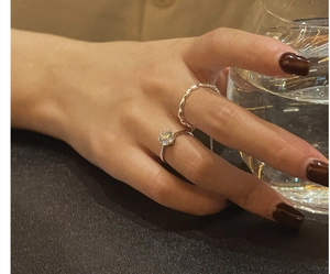 Detail of S925 sterling silver beaded ring and classic six-prong zircon ring set