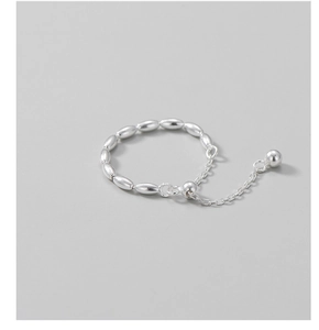 Detail of S925 sterling silver beaded ring with olive beads and delicate tassel chain