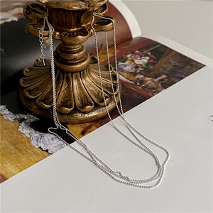 Élégant collier à billes en argent sterling S925 avec chaîne réglable sur socle doré
