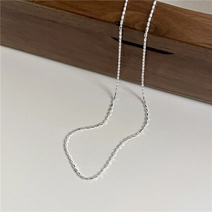 Detailed view of S925 sterling silver beaded chain with minimalist sparkling faceted links