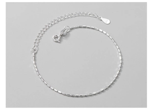 Detailed view of S925 sterling silver beaded bracelet with adjustable chain and logo tag