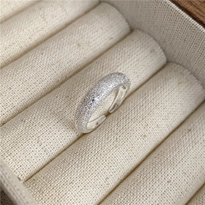 Macro view of S925 sterling silver ring showing sandblasted texture and S925 hallmark