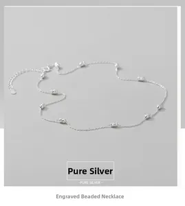 Detail of S925 sterling silver chain with engraved beads and adjustable lobster clasp