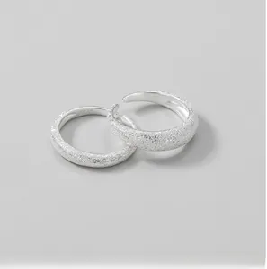 Detailed macro of S925 sterling silver ring showing sandblasted texture and S925 hallmark