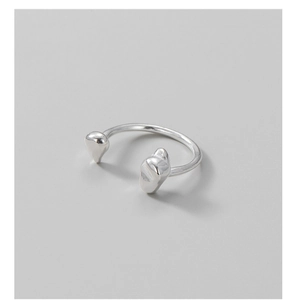 Macro shot of minimalist S925 sterling silver open ring with organic liquid drop design