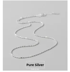 Macro shot of S925 sterling silver beaded chain necklace with polished faceted details