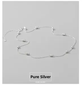 Detailed macro view of S925 sterling silver chain featuring faceted cylinder beads