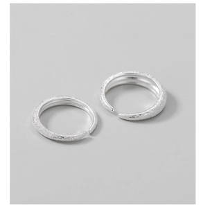 Detailed view of shimmering sandblasted S925 silver adjustable open rings for women