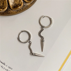 Detailed close-up of S925 sterling silver punk hoop earrings with chain and spike pendant