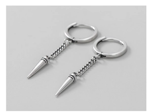Detail of S925 sterling silver punk earrings with spike pendant and chain link
