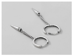 Close-up of S925 sterling silver hoop earrings with chain and punk cone pendants