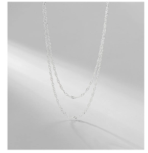 Detail view of S925 sterling silver double-layered water wave chain necklace texture