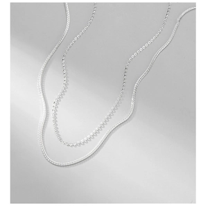 Close-up of S925 sterling silver cable and wheat chain necklaces with satin finish