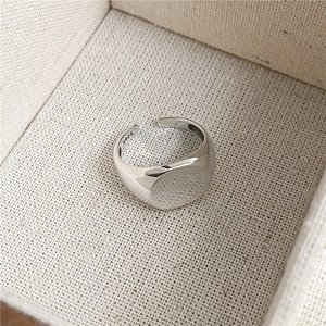 Detail of S925 sterling silver ring showing the inner S925 stamp and polished surface