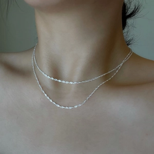 S925 sterling silver double-layer water wave chain necklace shown on neck