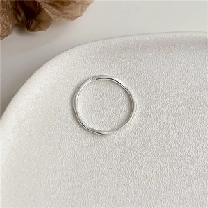 Close-up of S925 sterling silver hallmark on the minimalist irregular textured ring