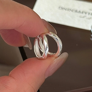 S925 sterling silver hoop earrings with geometric diamond-cut faceted surface