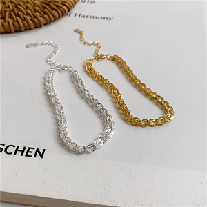 Detail of S925 sterling silver phoenix tail bracelets in gold and silver with lobster clasp